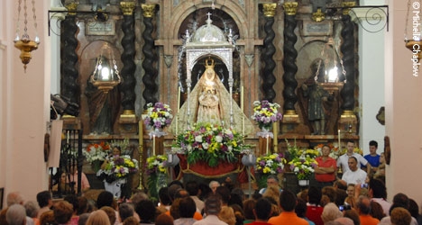 The Baroque alter of Virgin de la Sierra during the Romeria de los Gitanos.