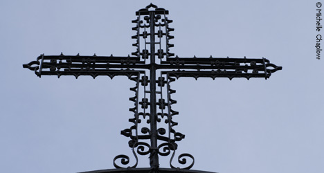 The wrought Iron cross of the Church of St Catherine
