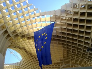 Another view of this curvy structure, with the European flag.