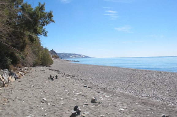 Beach at Castillo de Baños - grey sand but spotlessly clean.