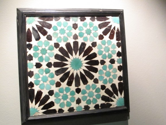 15th-century mosaic glazed earthenware tile with geometric pattern from Seville or Granada.