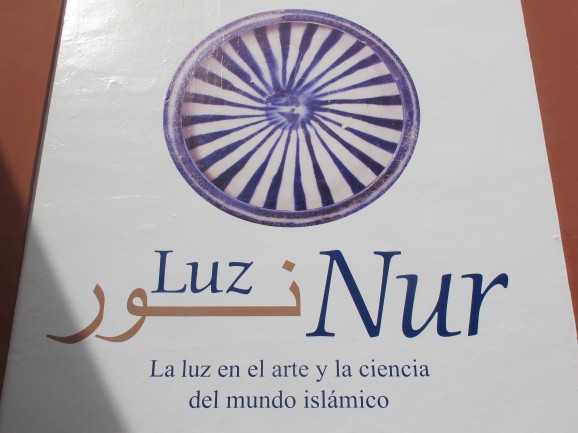 Sunlight shines on the wall of the Hospital de los Venerables in Seville, where this exhibition is being held.