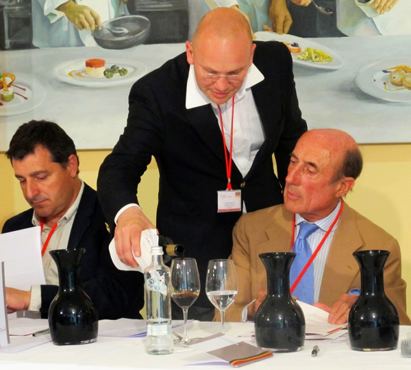 German sommelier pouring sherry for the jury