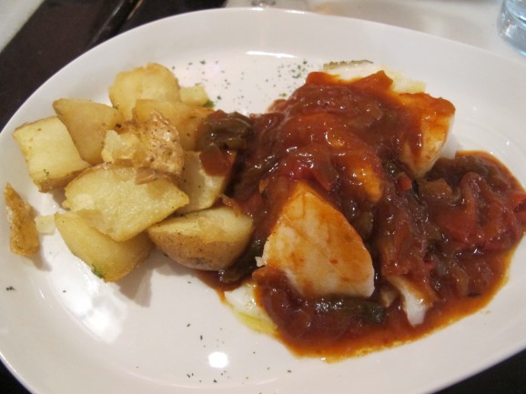 Our second tapa: cod a la roteña (a tomato and red pepper sauce) with baby roast potatoes.
