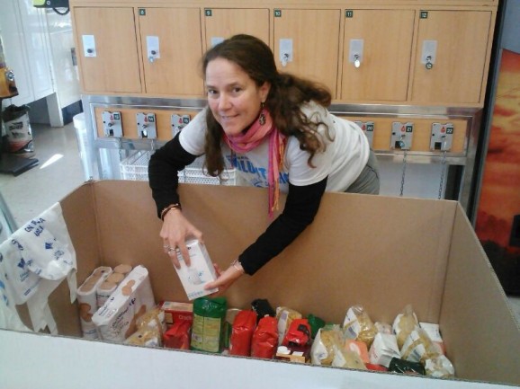 Volunteer Mary Aliceis one of the thousands helping with La Gran Recoogida - these are this morning's donations from shoppers.