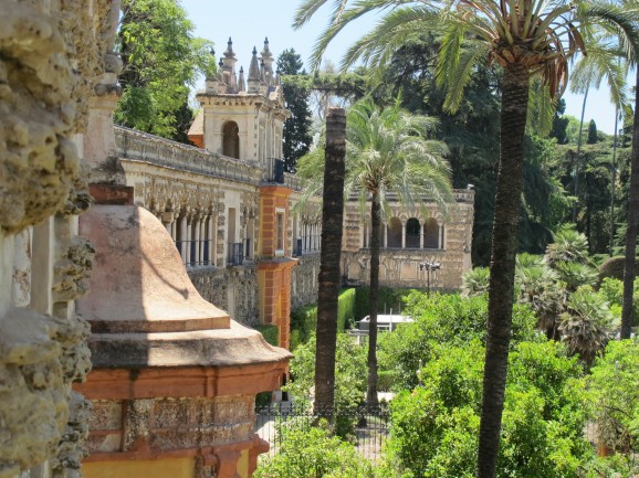 The Italianate grutesco in the Alcazar Gardens, with its arcaded gallery, provides a dramatic setting.