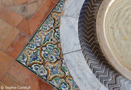 Hand-painted tiles and water fountains in Seville's grand Alcazar. © Sophie Carefull  