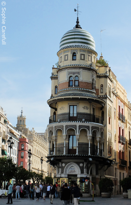 Amazing architecture on Seville's busy Calle Constitucion.  © Sophie Carefull  