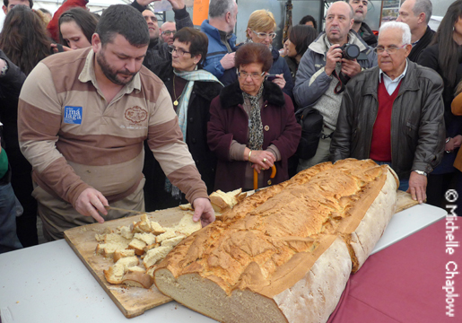 The village baker made an enormous loaf of fresh bread for the event. © Michelle Chaplow .