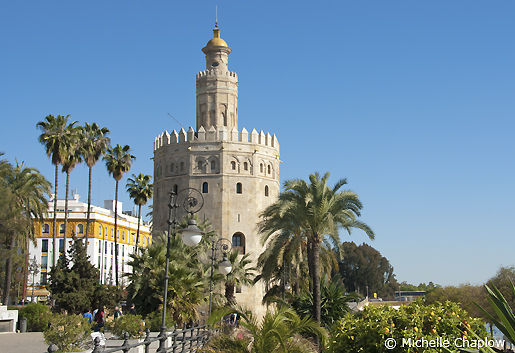 The traditional rounded arches became more pointed, as seen in the Torre del Oro The traditional rounded arches became more pointed, as seen in the Torre del Oro