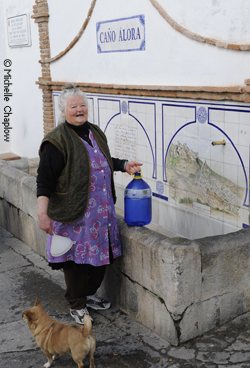 Collecting water from the village fountain Collecting water from the village fountain