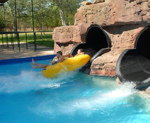 The light at the end of the Black Hole slide! © Aquapolis, Sevilla The light at the end of the Black Hole slide! © Aquapolis, Sevilla