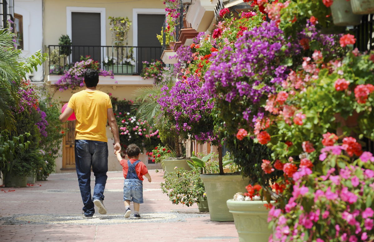Estepona's charming old town, where vibrant flowers bloom around every corner © Michelle Chaplow