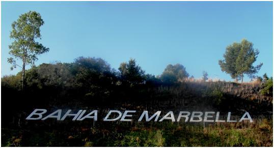 Signs of the times, 'MARBELLA BAY' road sign near Hospital Costa del Sol