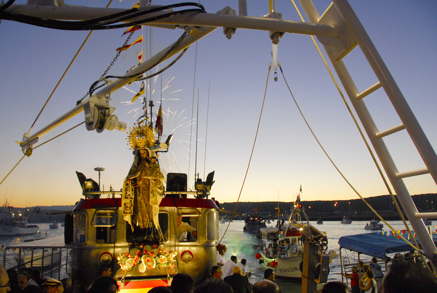 Sailing in Barbate during the vibrant celebration of the Virgin del Carmen, the patron saint of fishermen. Each year on July 16th, this picturesque fishing town, along with many others, honors her with lively festivities and maritime processions. © Michelle Chaplow