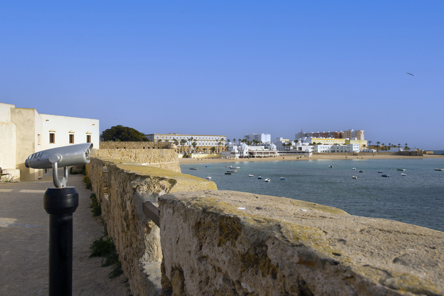 La Caleta Beach seen from the city walls of Cádiz — a serene stretch of sand framed by history and the Atlantic breeze © Michelle Chaplow