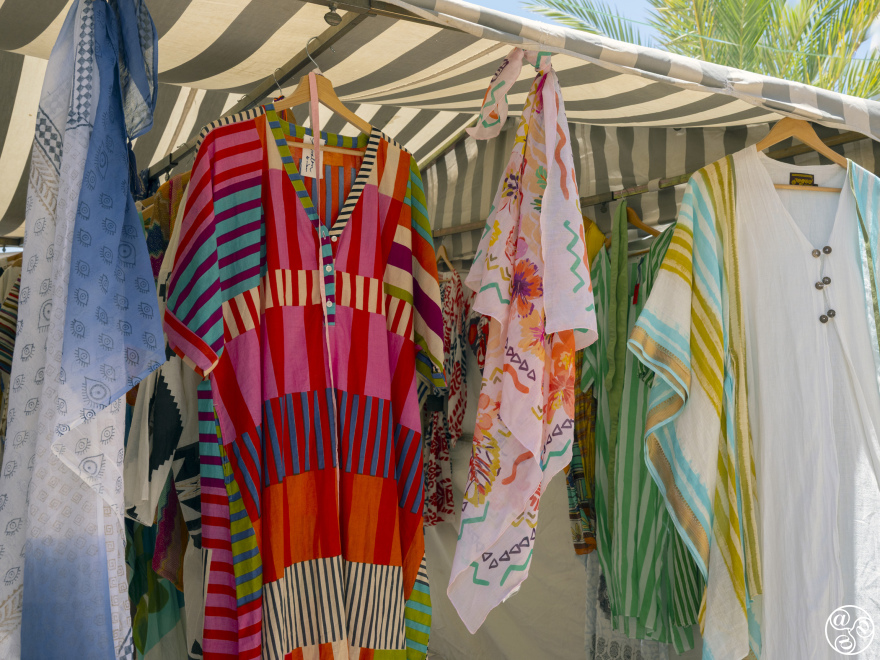 Colourful fabrics at the Sotogrande Market © Michelle Chaplow
