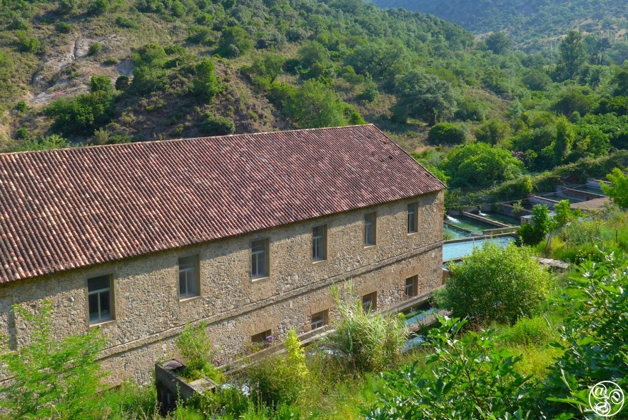 The old trout farm can be seen just below the spring, on the way to the village pool