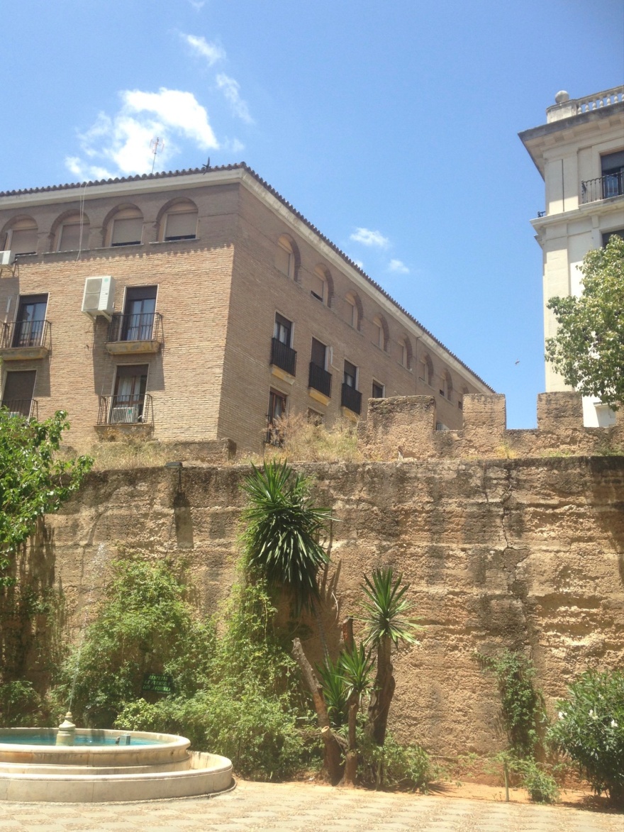 Plaza del Calbildo, crenellated wall dates from moorish times. © Fiona Flores Watson