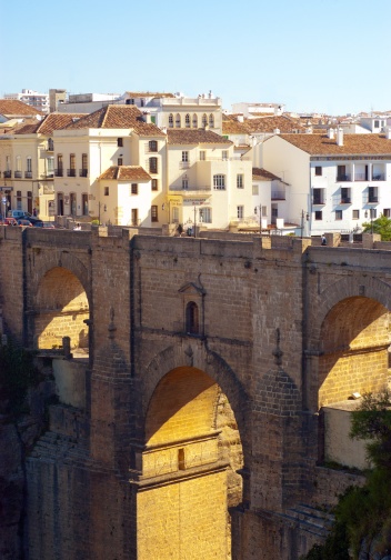 The spectacular setting of Ronda situated on top a of deep gorge spanned by a magnificent stone bridge © Michelle Chaplow