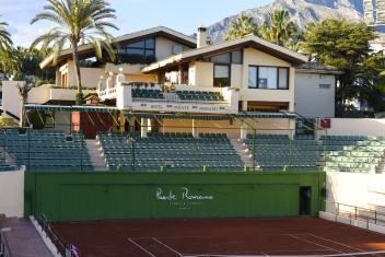 Puente Romano Tennis Club, surrounded by palm trees with the iconic Concha Mountain as a backdrop. © Michelle Chaplow