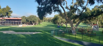 18th green in the early morning Saturday light, all ready for action