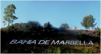 Signs of the times, 'MARBELLA BAY' road sign near Hospital Costa del Sol