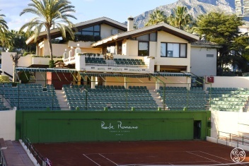 Puente Romano Tennis Club, surrounded by palm trees with the iconic Concha Mountain as a backdrop. © Michelle Chaplow
