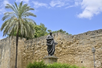 Statue of the Roman philosopher Seneca near Puerta de Almodóvar and the ancient city walls of Córdoba, Spain — a tribute to one of the city’s most renowned historical figures. © Michelle Chaplow