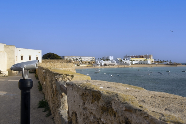 La Caleta Beach seen from the city walls of Cádiz — a serene stretch of sand framed by history and the Atlantic breeze © Michelle Chaplow
