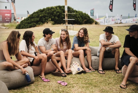 GWA Wingfoil World Cup Tarifa 2025 - Competitors chatting - Nia Suardiaz, defending champion 2nd from left. (c) Samual Cadenas