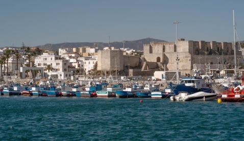 Impressive view from the sea - towering over the old town, the castle is a 1000-year-old Moorish fortification. © Michelle Chaplow
