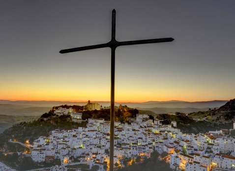 Casares, with its Moorish castle, which stands proud on the hillside, a simple cross on top of the hill- a discreet but visible symbol of Christianity, both relfect the rich history of Andalucia. © Michelle Chaplow