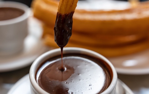 Chocolate Y Churros (spiral shaped deep fried doughnuts) and hot chocolate for dunking.