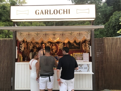 Stall of Garlochi, the famous Semana Santa bar. ©Fiona Flores Watson Buying some drinks (C) Fiona Flores Watson