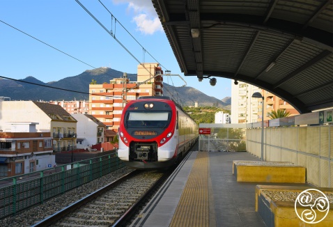 Train arriving at Los Boliches railway station © Michelle Chaplow