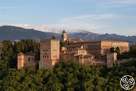 The Alhambra glows warm against the cool, snow-dusted Sierra Nevada — an iconic Granada view that captures the spirit of Andalucía. © Michelle Chaplow