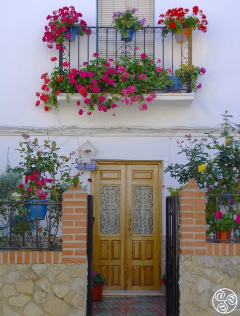Doorway and flowers in Pujerra Doorway and flowers in Pujerra