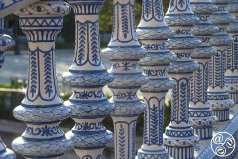 Blue-and-white ceramic tiles at Plaza de España in Seville, featuring traditional Andalusian patterns © Michelle Chaplow